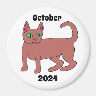 Katt, brun, grönt ögon, svan, oktober 2024 magnet