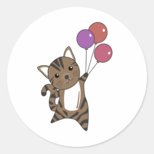 Katt flyter upp med färgstarka ballonger runt klistermärke