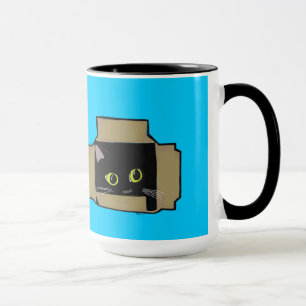 Katt i en boxas mugg