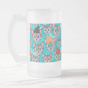 Katt i hatten frostat ölglas