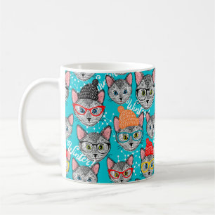 Katt i hatten kaffemugg