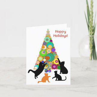 Katt julkort som rinner runt julklappen helgkort