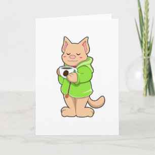 Katt med kopp kaffe och pyjamas kort