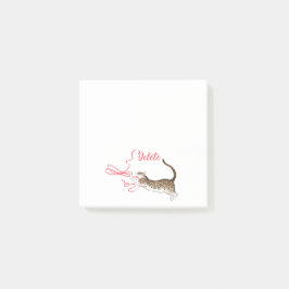 Katt med menyfliksmeddelande efter det att den har post-it block