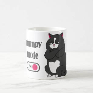 Katt med rolig tjock kaffemugg