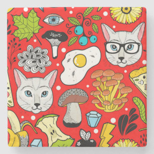 Katt och ägg på rött stenunderlägg