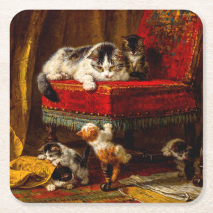 Katt och kattungar som leker med stol underlägg papper kvadrat