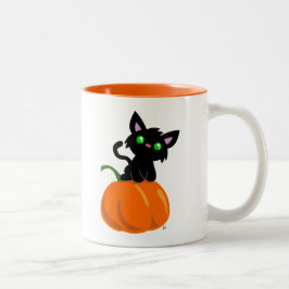 Katt på en Pumpkin Coffee Mugg