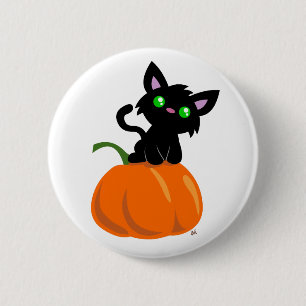 Katt på en pumpknapp knapp