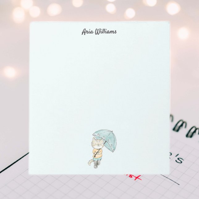 Katt på regnstationssaker post-it block (Skapare uppladdad)