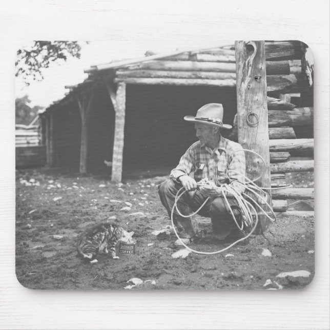 Katt som äter ut ur ett kaffe Can. Musmatta (Framsidan)