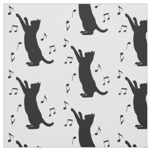 Katt som leker med musik noter tyg