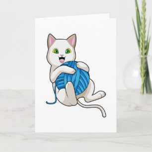 Katt som leker med ull kort