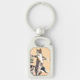 Katt som ska spela rektangulärt silverfärgad nyckelring