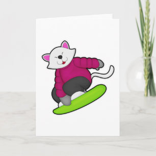 Katt som snöskidåkare med snowboard kort