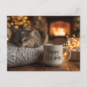 Katt som sover bredvid en "God Jul"-mugg Vykort
