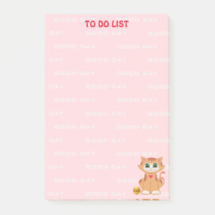 Kattanimering på rosa att göra-lista post-it block