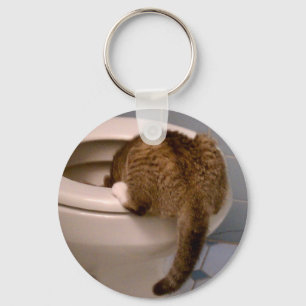 Kattdrinkar gillar en hund KeyChain Nyckelring