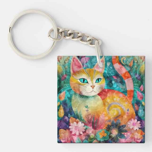 Katten med slående gröna ögon i blomsterträdgården (Framsidan)