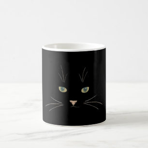 Kattens ansikte med ögon, näsa och whisky kaffemugg