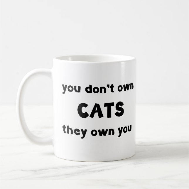 katter äger inte kaffemugg (Vänster)
