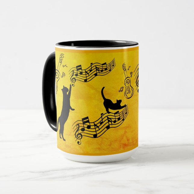Katter är som musik: Notlinjer & Gitarrer i guld Mugg (Framsida vänster)