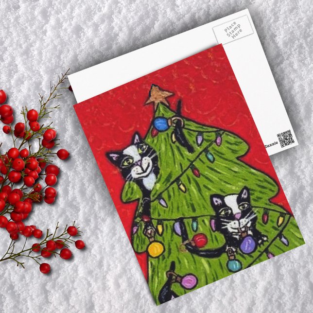Katter i julgrans vykort (Naughty cats climbing in Christmas tree on red Merry Christmas postcard.)