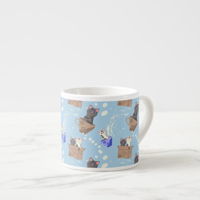 Katter i låda och mjölk droppar i blått espressomugg (Framsida höger)