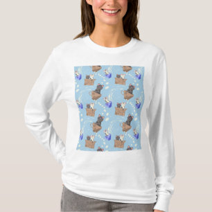 Katter i låda och mjölk droppar i blått t shirt