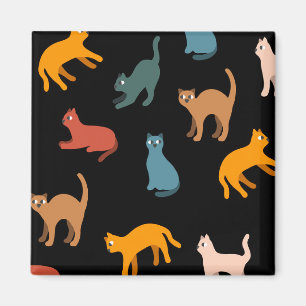 Katter på svart magnet