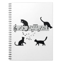 Katter som spelar Musik noter