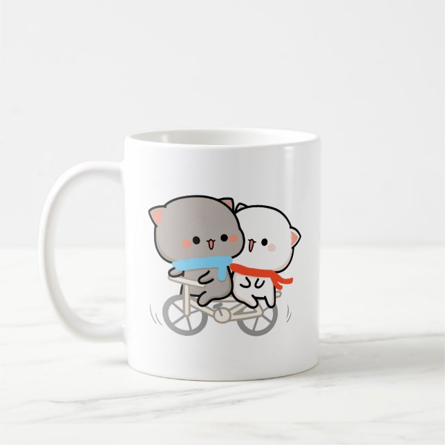 kattpersika och goma kaffemugg (Vänster)