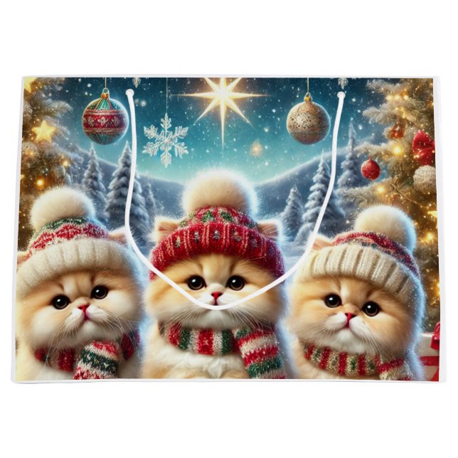 Kattungar i festlig juldekoration och snö (Framsidan)