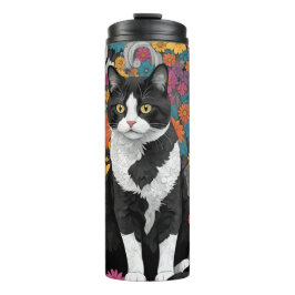 Kattunge bland blommorna