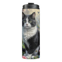 Kattunge i blomsterträdgården