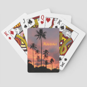 Kauai solnedgång som leker kort spel kort