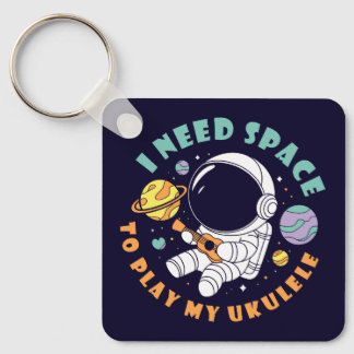 Kawaii Astronaut spelar Ukulele i Space Nyckelring