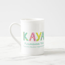 Kaya namn-grafikblommor stjärnor grönt gult rosa benporslin mugg