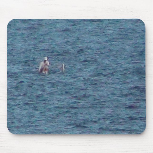 Kayakeren målar in musmatta (Framsidan)