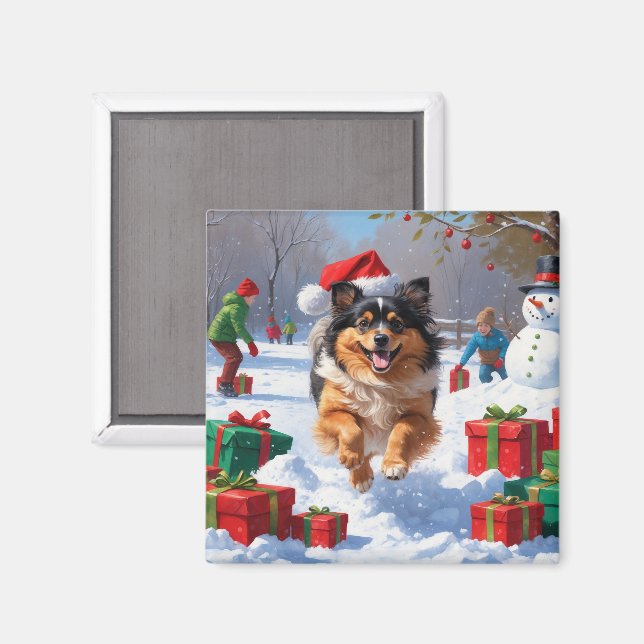 Keeshond-hund springer i snö med julhatt magnet (Front/Back)
