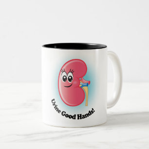 Kelly Kidney ’Urine Bra Händer’ Kaffe Mugg