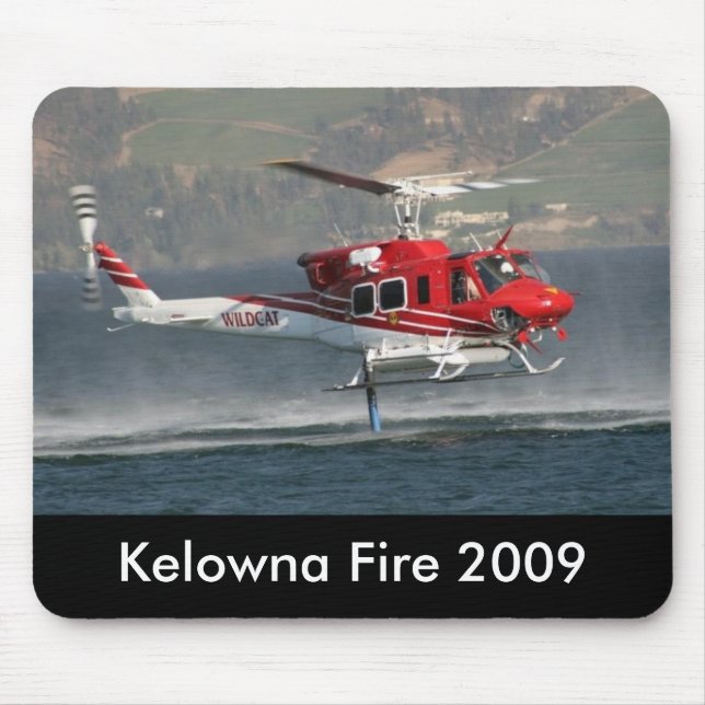 Kelowna avfyrar mousepad 2009 musmatta (Framsidan)