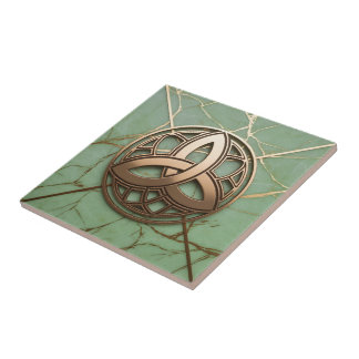 Keltisk triquetra på salvia-marmor med guldådror kakelplatta