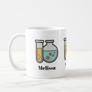 Kemiskt teströr och bägare kaffemugg