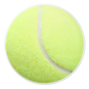 Keramisk knopp för tennisboll