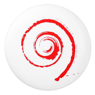 Keramisk knopp med röd twirl