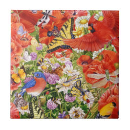 Keramiska fåglar, fjärilar och bin belägger med kakelplatta