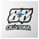 Keramiskt plattor kakelplatta<br><div class="desc">"88 Oliveira Ceramic Tile - Art in Rörelse" känner att spåret har kört fast. Den här keramiska plattan, som är försedd med symbolen 88 Oliveira, är mer än dekorerad. Den är en rörelse som är frusen i konst. Med fet stil, levande energi och en palett som pulserar med hastighet, firar...</div>