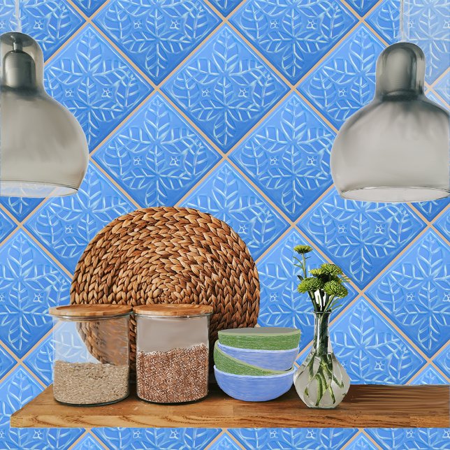 Keramiskt plattor med blå Löv från Styliserad ovat Kakelplatta (Blue ovate leaf tile shown on a kitchen backsplash.)