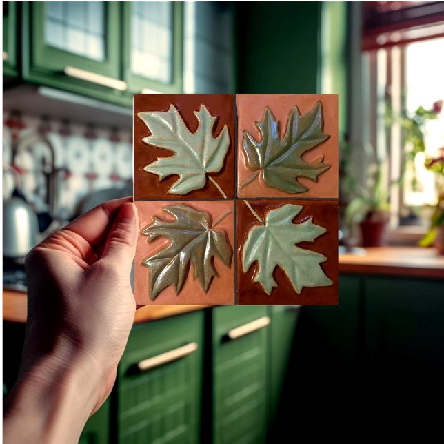 Keramiskt plattor med fyra löv kakelplatta (Tile with 4 maple leaves heald in the hand.)